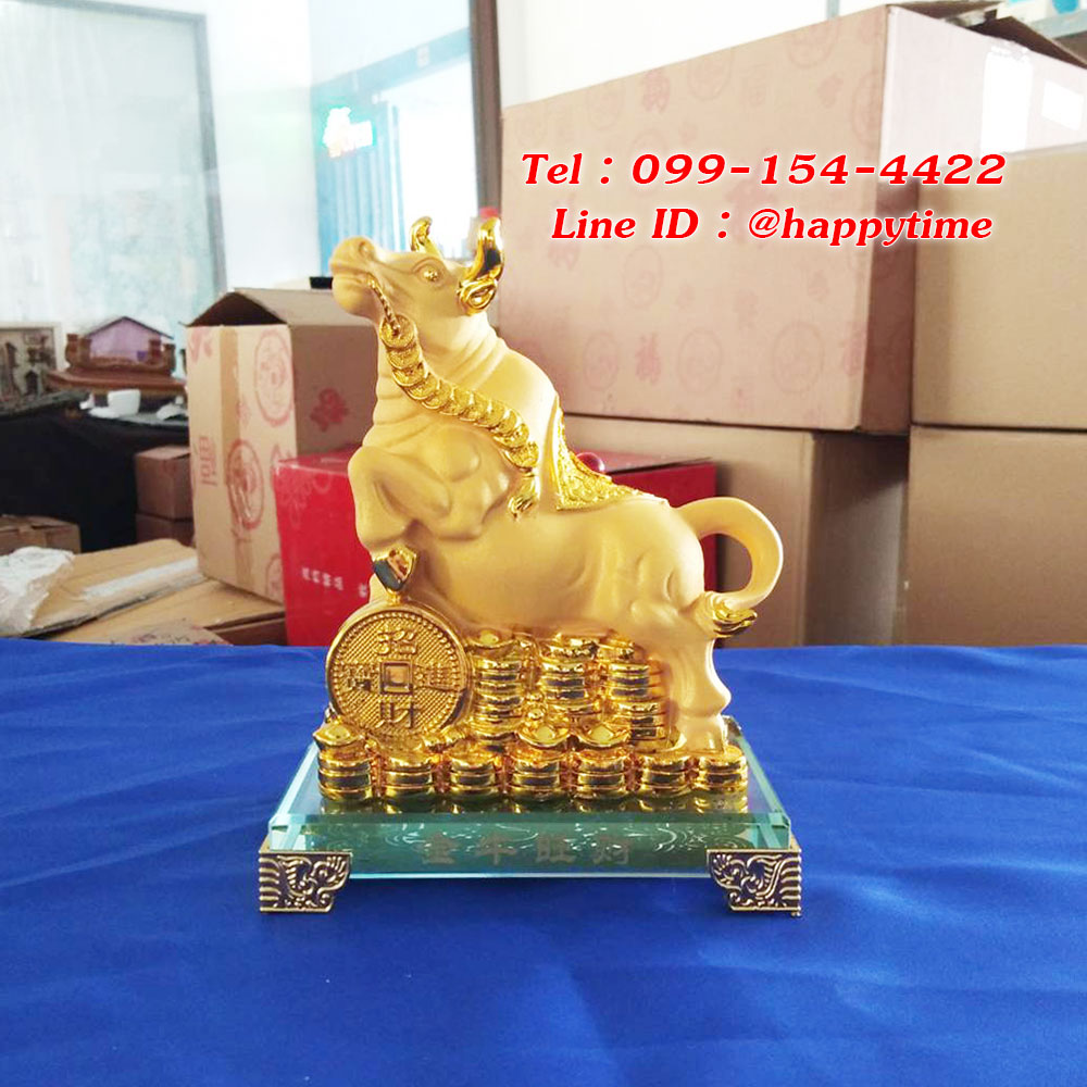 รูปปั้นวัวกระทิงบนกองสมบัติ ของขวัญขึ้นบ้านใหม่สำหรับคนเกิดปีวัว