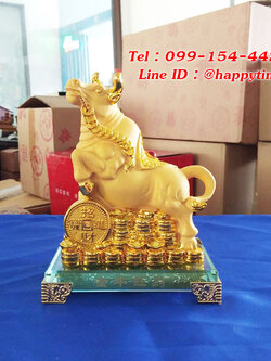 รูปปั้นวัวกระทิงบนกองสมบัติ ของขวัญขึ้นบ้านใหม่สำหรับคนเกิดปีวัว
